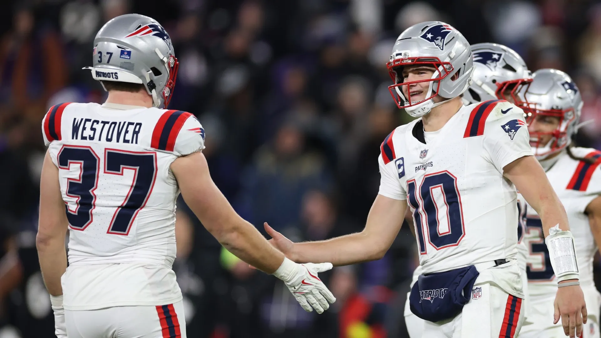 Drake Maye #10 and Jack Westover #37 of the New England Patriots. (Photo by Patrick Smith/Getty Images)