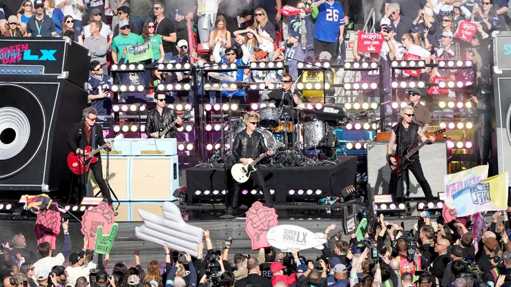 Green Day performs prior to the start of Super Bowl LX.