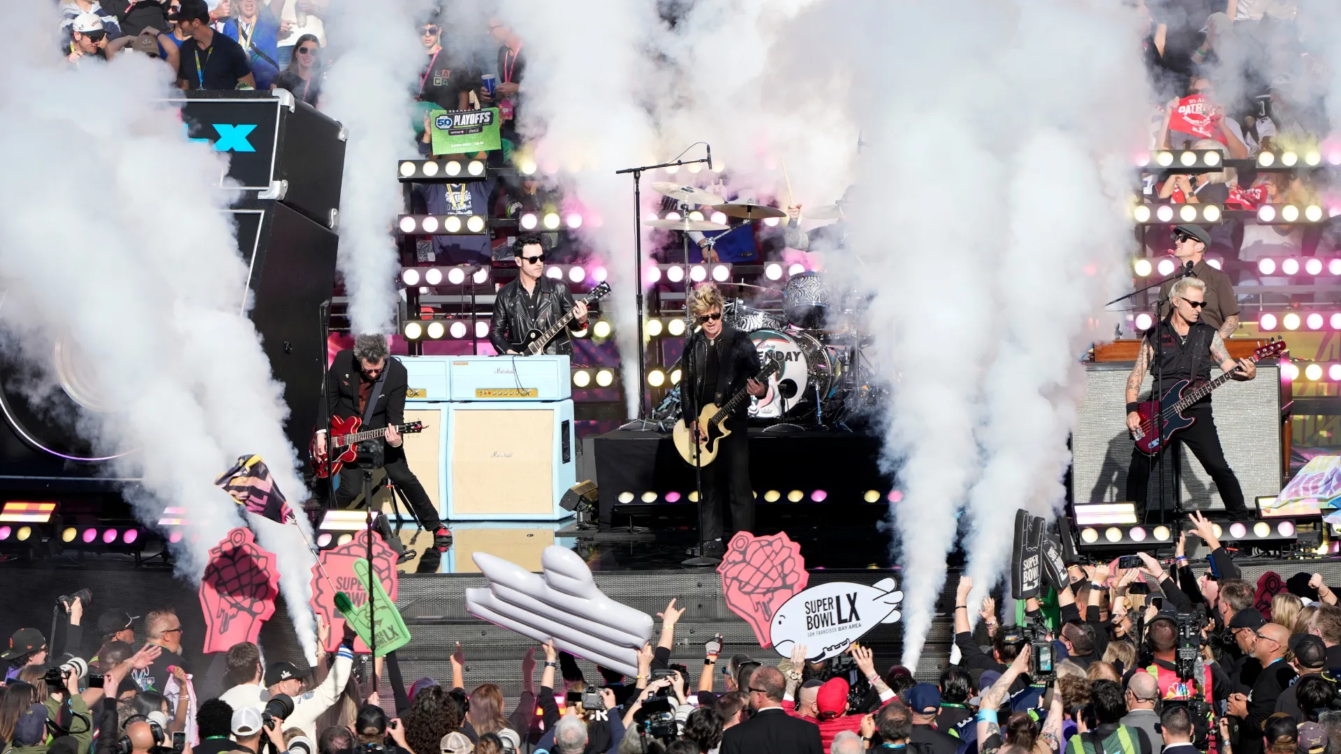 Green Day performs prior to the start of Super Bowl LX (Source: Thearon W. Henderson/Getty Images)