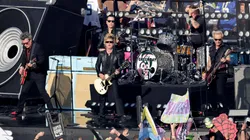 Billie Joe Armstrong, Tré Cool and Mike Dirnt of Green Day perform during Super Bowl LX.