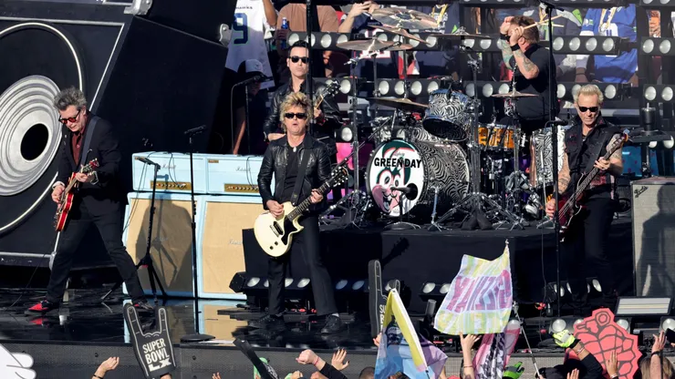 Billie Joe Armstrong, Tré Cool and Mike Dirnt of Green Day perform during Super Bowl LX.