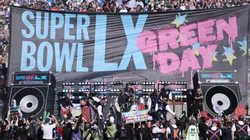 Billie Joe Armstrong, Tré Cool and Mike Dirnt of Green Day perform during Super Bowl LX pregame show.