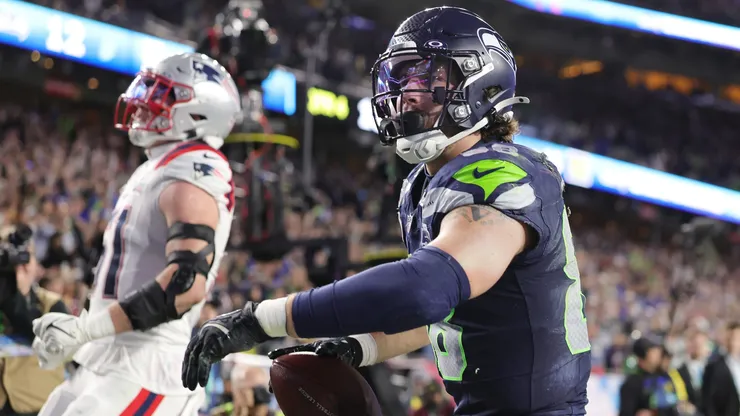 AJ Barner of the Seahawks reacts after scoring a touchdown against the New England Patriots.