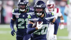 Julian Love of the Seahawks runs after intercepting a pass during the Super Bowl LX.