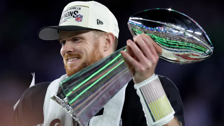Sam Darnold of the Seahawks celebrates with the Vince Lombardi Trophy after winning Super Bowl LX.