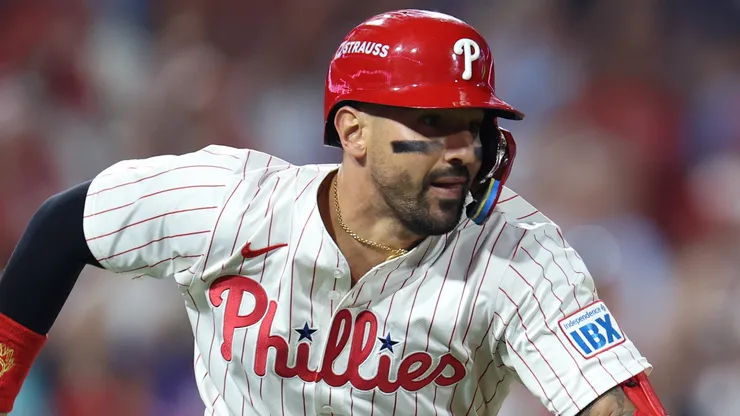 Nick Castellanos #8 of the Philadelphia Phillies hits a two-RBI double.