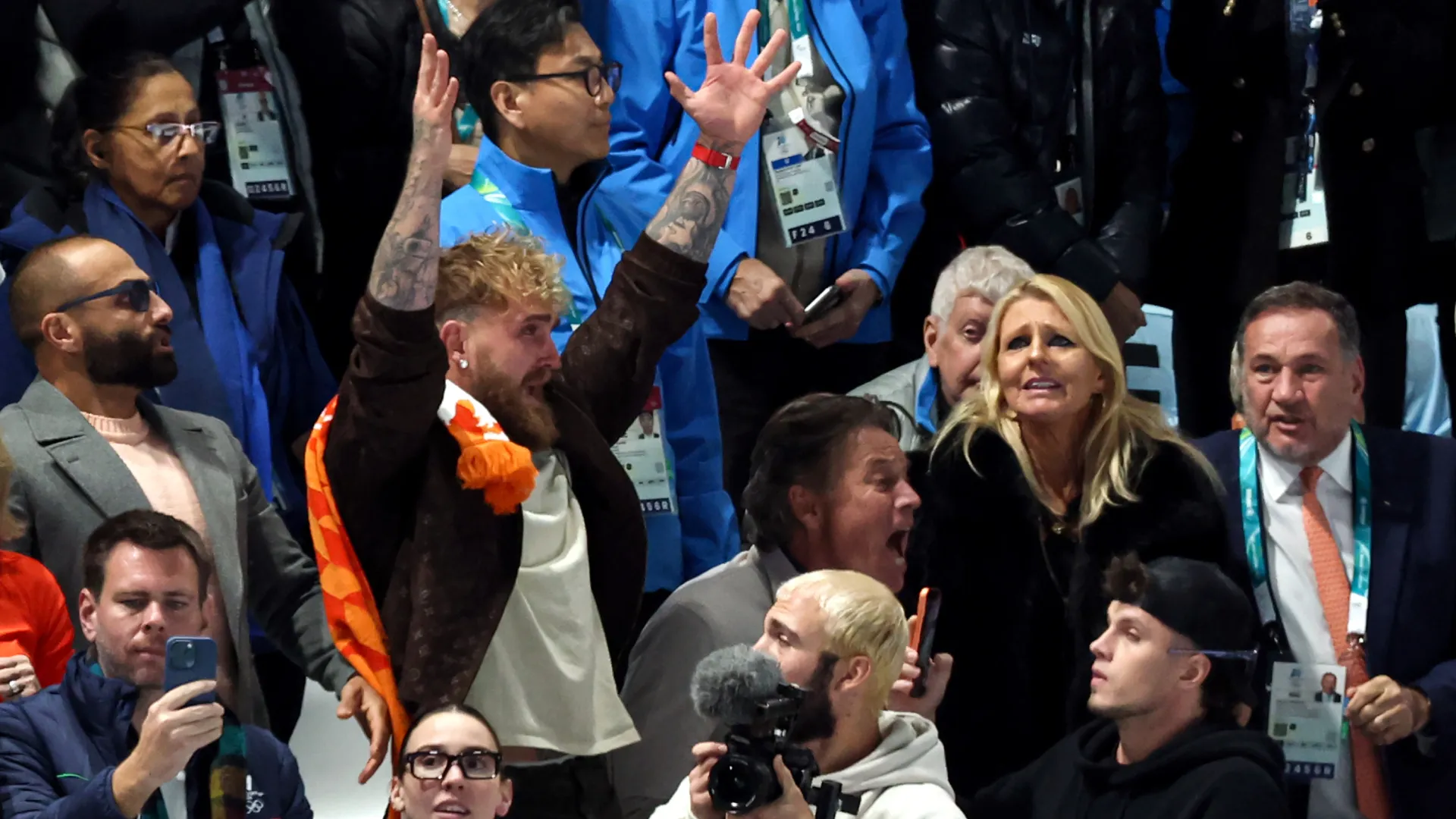 Jake Paul celebrates in the stands after his fiancee Jutta Leerdam wins Gold. (Getty Images)