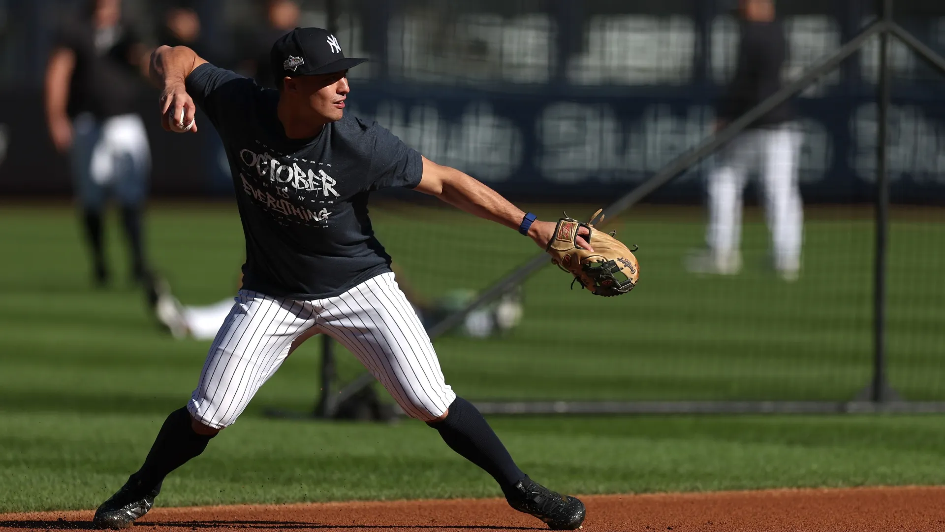 Anthony Volpe #11 of the New York Yankees warms up. Ishika Samant/Getty Images