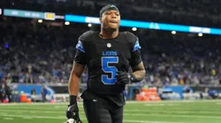 David Montgomery #5 of the Detroit Lions jogs across the field.