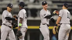 Trent Grisham #12, Jazz Chisholm Jr. #13, Cody Bellinger #35 and Anthony Volpe #11 of the New York Yankees celebrate.