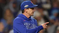 Manager Craig Counsell #11 of the Chicago Cubs makes a pitching change.