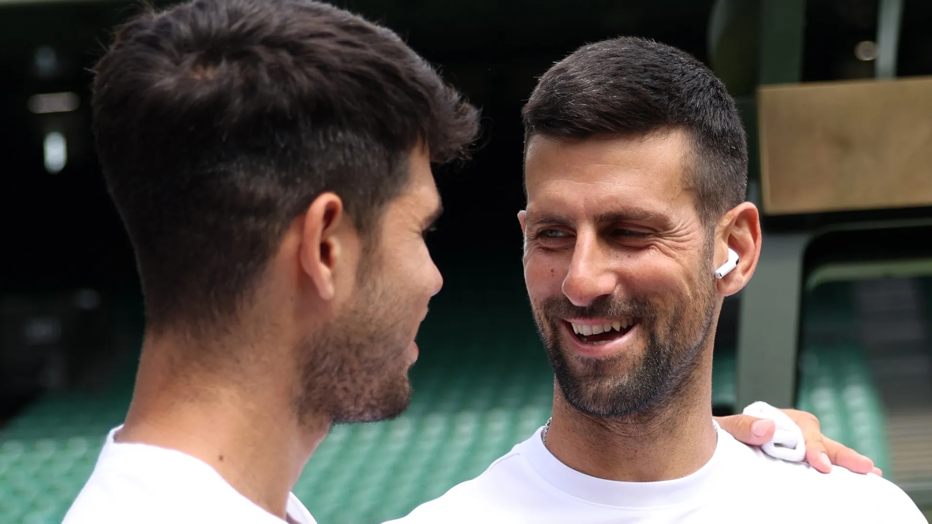 Alcaraz and Djokovic smiling in practice