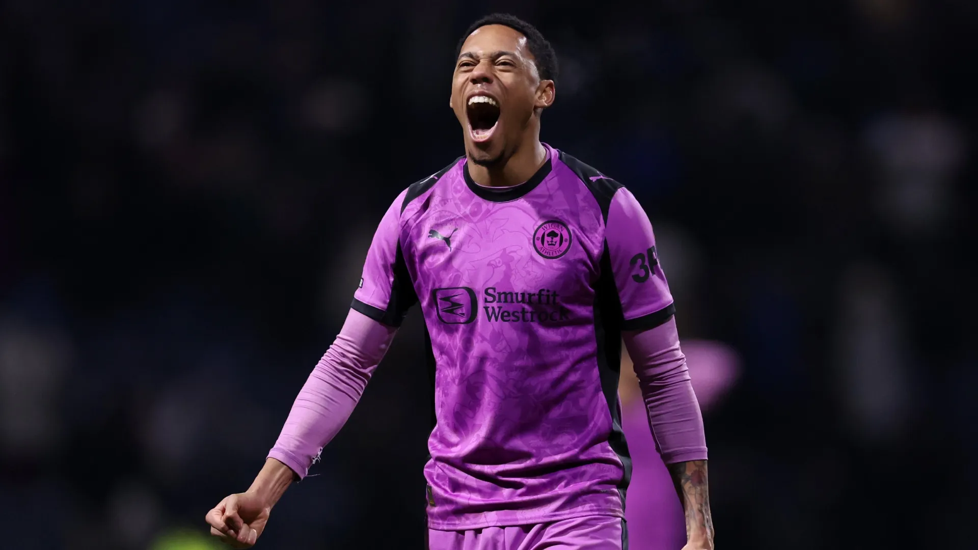 Maleace Asamoah of Wigan Athletic ā Alex Livesey/Getty Images