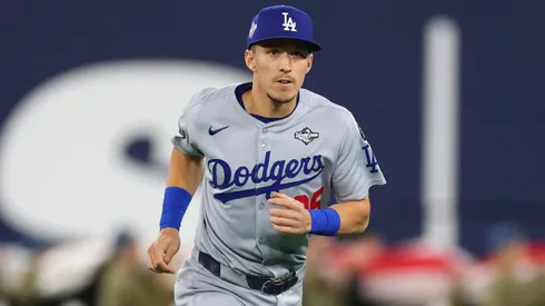 Tommy Edman #25 of the Los Angeles Dodgers warms up.
