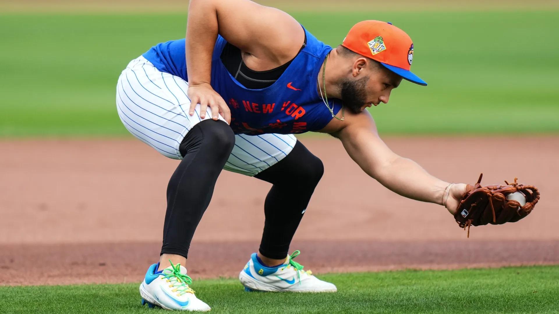 Bo Bichette #19 of the Mets fields a ground ball during spring training workouts. Rich Storry/Getty Images