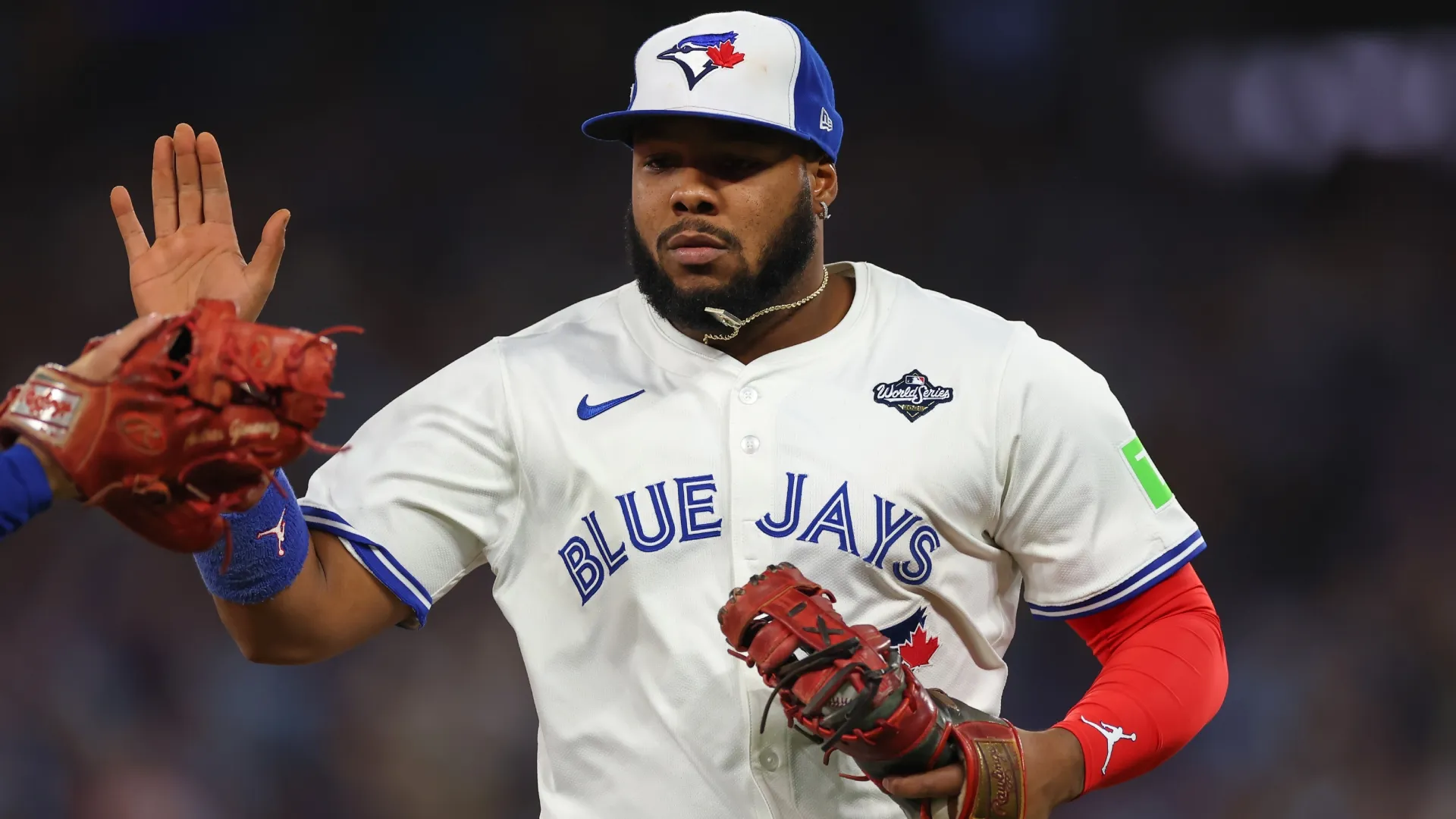Vladimir Guerrero Jr. #27 of the Blue Jays celebrates after the third out against the Dodgers. Gregory Shamus/Getty Images)
