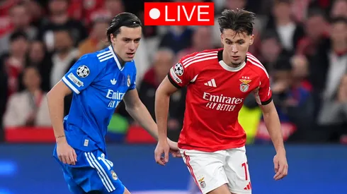 Amar Dedic of Benfica is challenged by Alvaro Carreras of Real Madrid.
