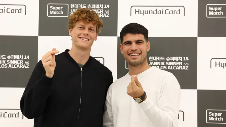 Jannik Sinner of Italy and Carlos Alcaraz of Spain attend the press conference.