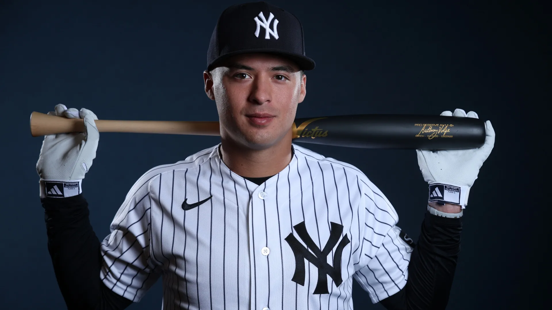 Anthony Volpe #11 of the New York Yankees poses during Photo Day. Chris Graythen/Getty Images