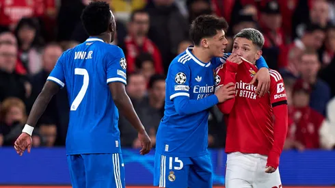 Gianluca Prestianni of Benfica speaks towards Vinicius Junior of Real Madrid.