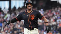 Rafael Devers #16 of the San Francisco Giants reacts.