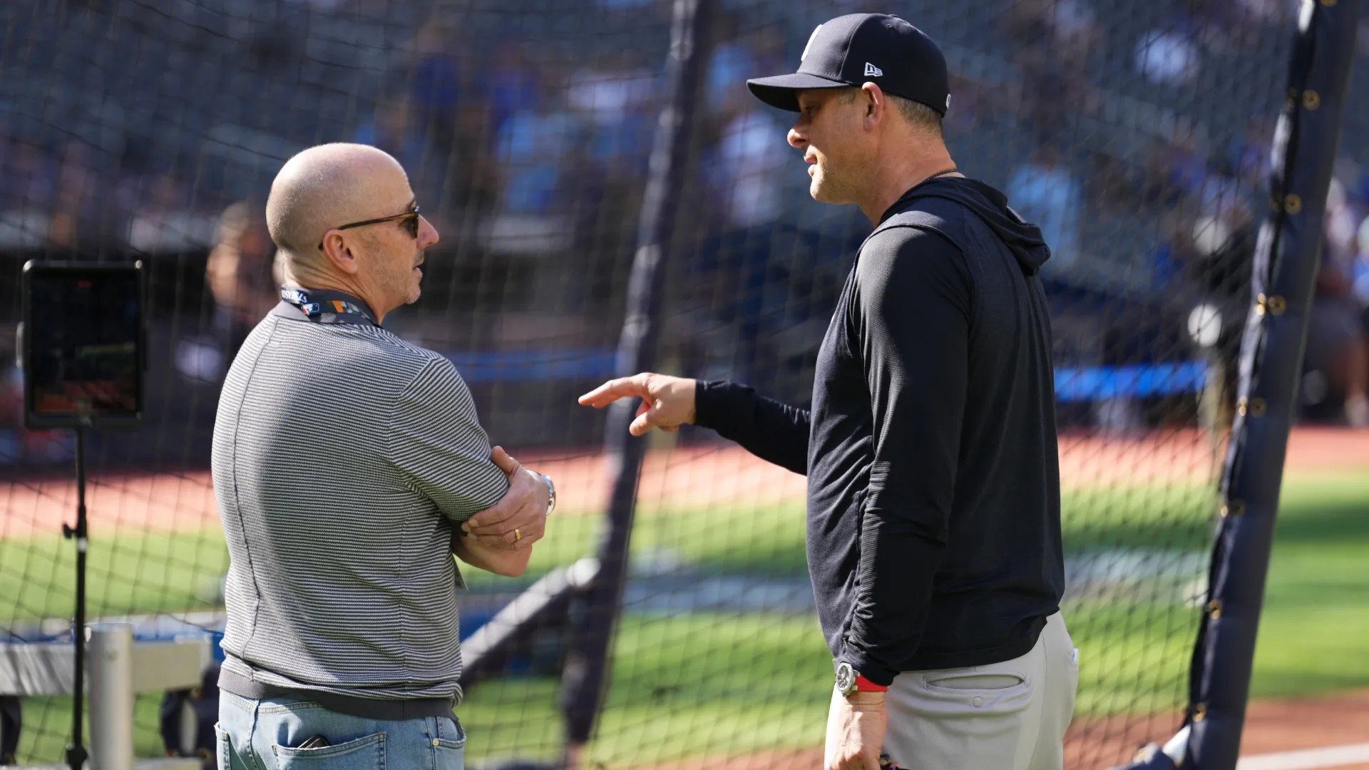 Brian Cashman General Manager of the Yankees, and Aaron Boone. Mark Blinch/Getty Images