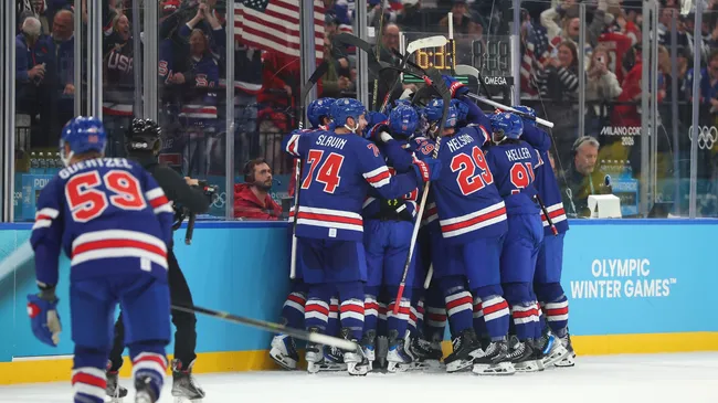 Team USA celebrates after Quinn Hughesâ overtime winner