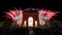 A firework display is seen at the Arco della Pace after the lighting of the Olympic cauldron during the opening ceremony.