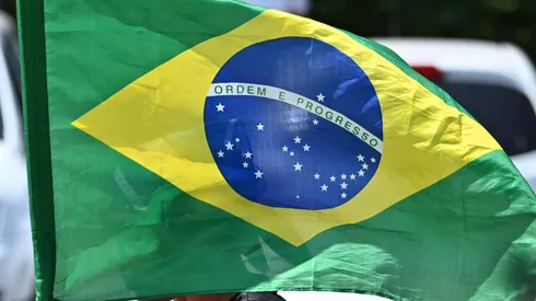Fan waves a Brazilian flag