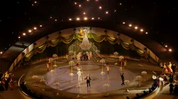A general view of an illuminated chandelier as performers dance during the Milano Cortina 2026 Winter Olympics Closing Ceremony.