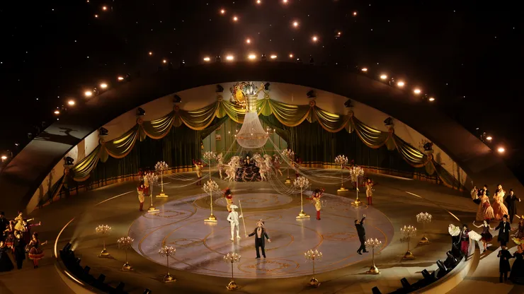 A general view of an illuminated chandelier as performers dance during the Milano Cortina 2026 Winter Olympics Closing Ceremony.