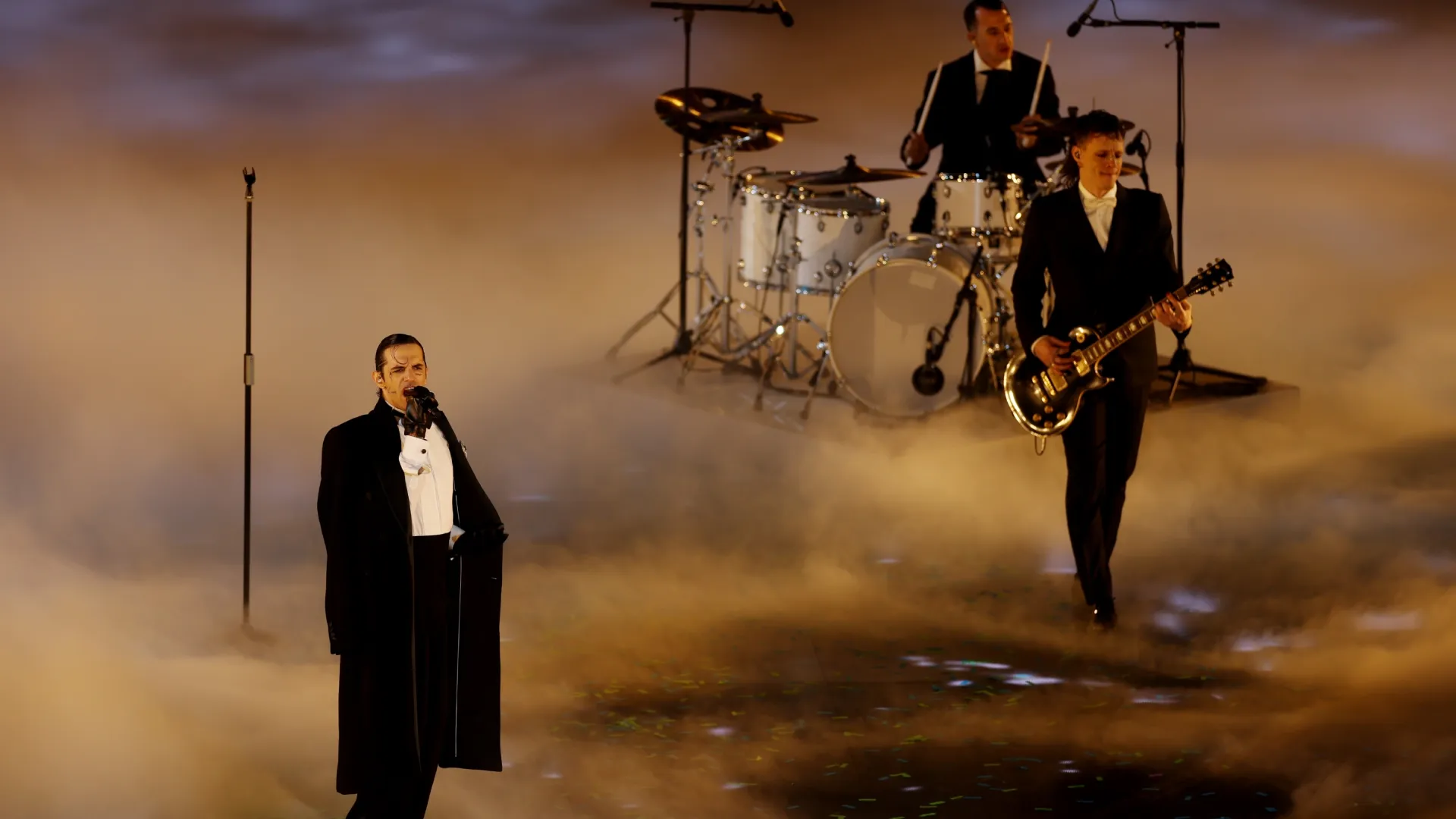 Achille Lauro and his band perform during the Milano Cortina 2026 Winter Olympics Closing Ceremony (Source: Dean Mouhtaropoulos/Getty Images)