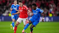 Vinicius Junior of Real Madrid is challenged by Amar Dedic of Benfica