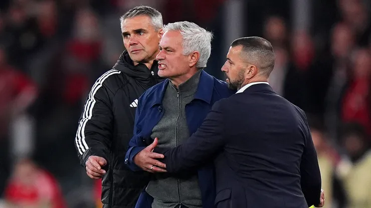 Jose Mourinho, Head Coach of Benfica, is shown a red card.