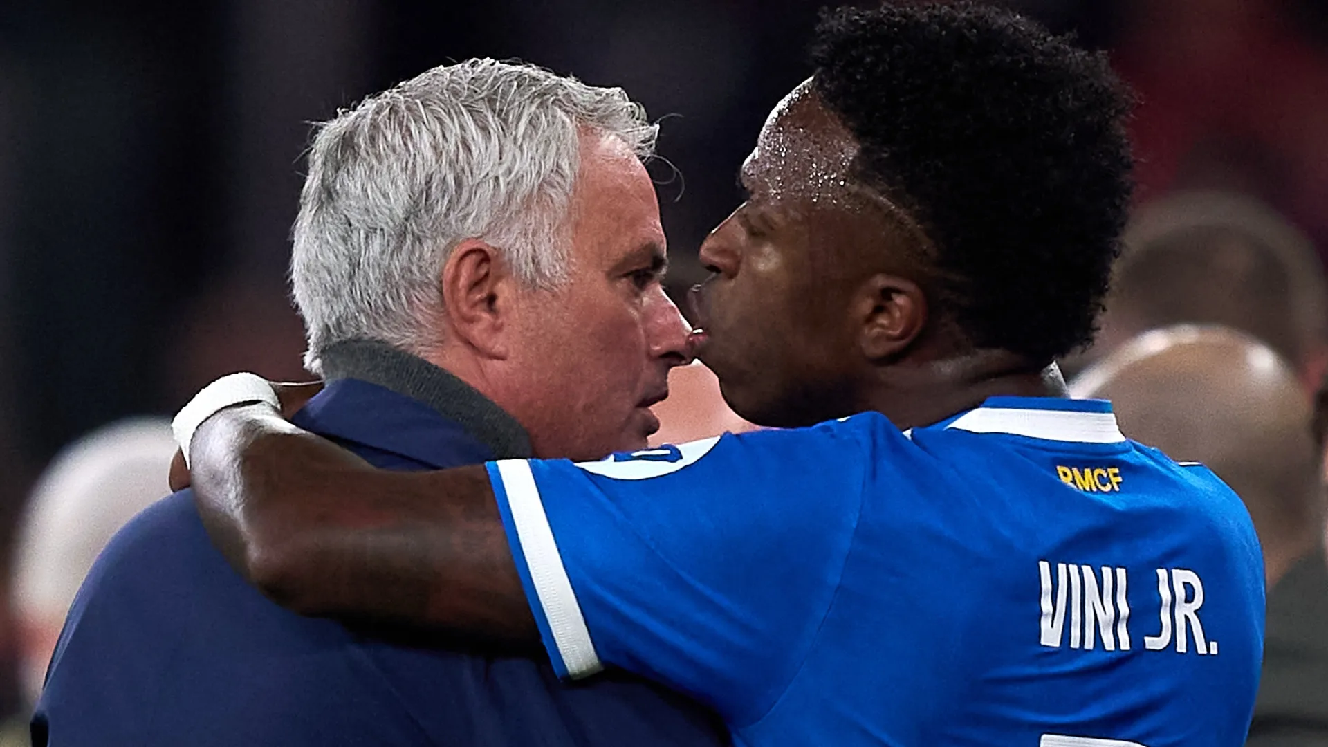 Vinicius Jr. of Real Madrid speaks to Jose Mourinho, Head Coach of SL Benfica. Leagu Angel Martinez/Getty Images