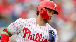 Bryce Harper #3 of the Phillies runs out a hit against the Pirates.