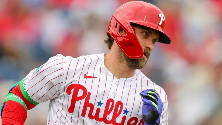 Bryce Harper #3 of the Phillies runs out a hit against the Pirates.