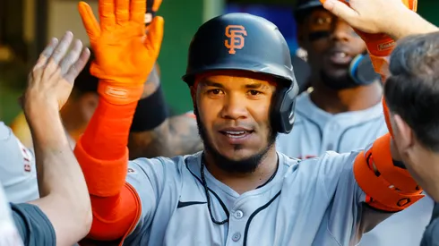 Thairo Estrada #39 with the Giants celebrates his two-run home run.