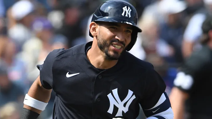 Jose Caballero #72 of the Yankees hits a solo home run.
