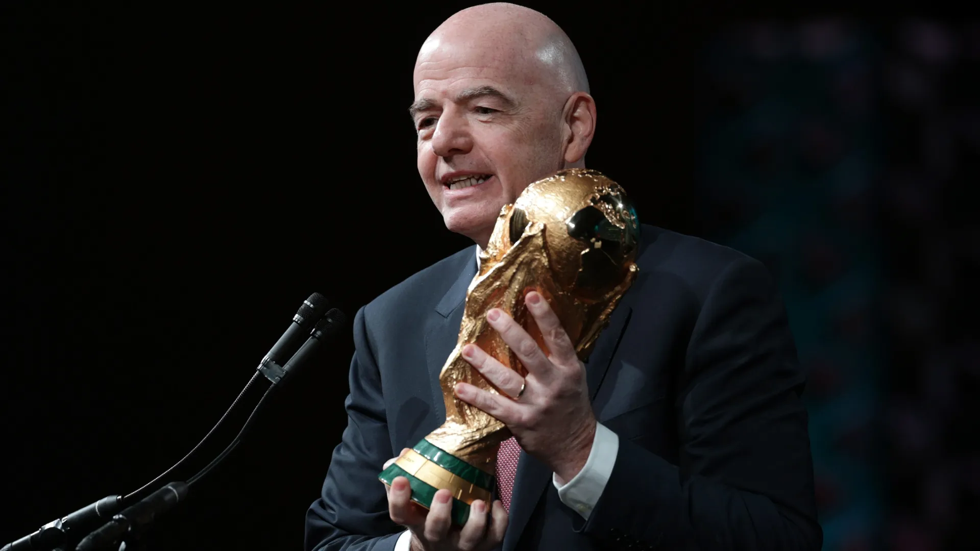 FIFA President Gianni Infantino holds the FIFA World Cup Trophy. Alex Wong/Getty Images
