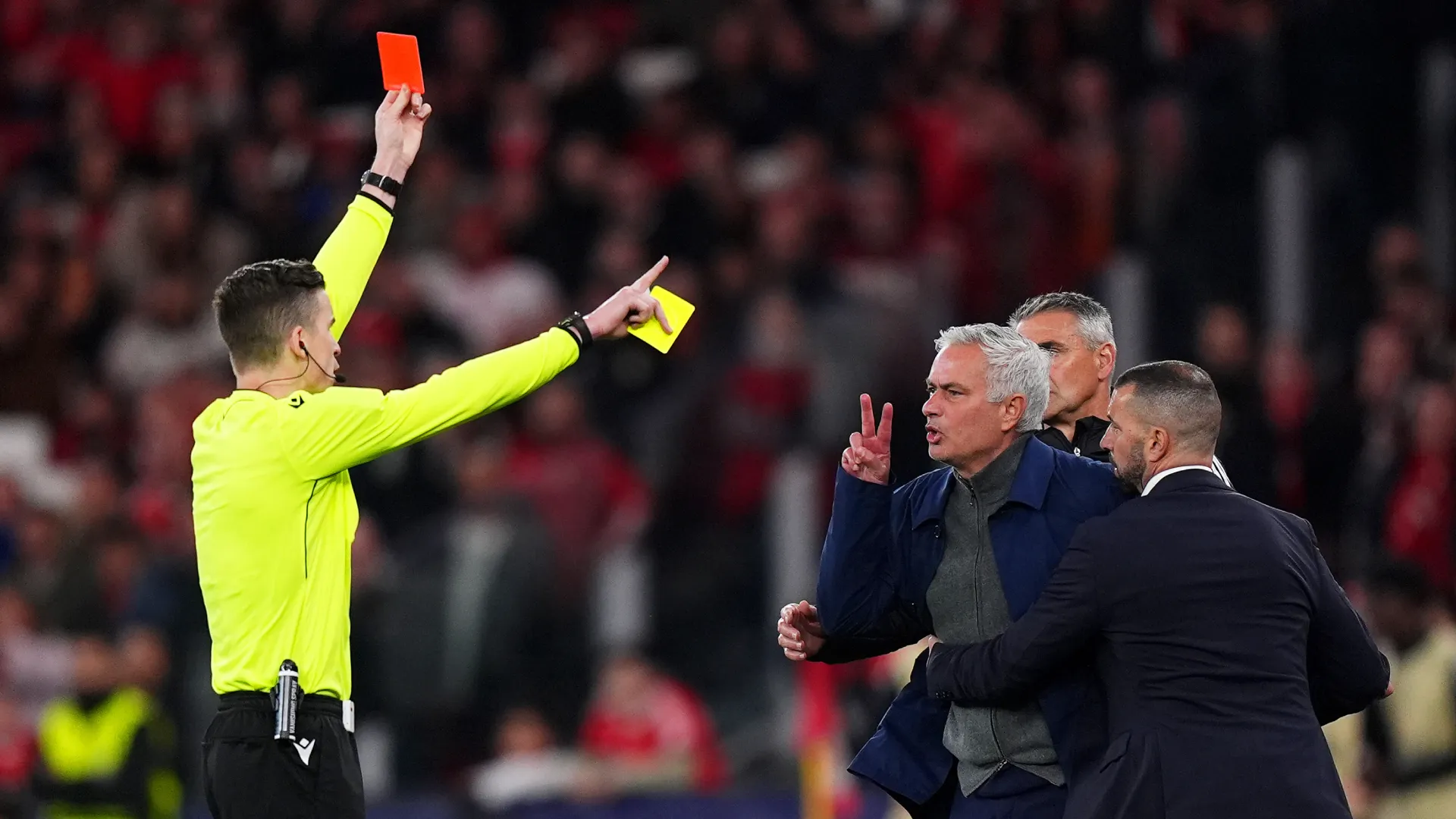 Jose Mourinho is shown a red card by referee Francois Letexier. (Getty Images)