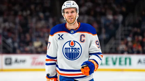Connor McDavid #97 of the Edmonton Oilers skates during a TV timeout in 2025.