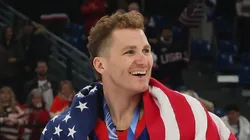 Matthew Tkachuk celebrates after winning gold in the Winter Olympics