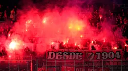 Fans of SL Benfica set off smoke flares at Estadi Olímpic Lluís Companys