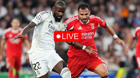 Antonio Ruediger of Real Madrid battles for possession with Evangelos Pavlidis of Benfica.
