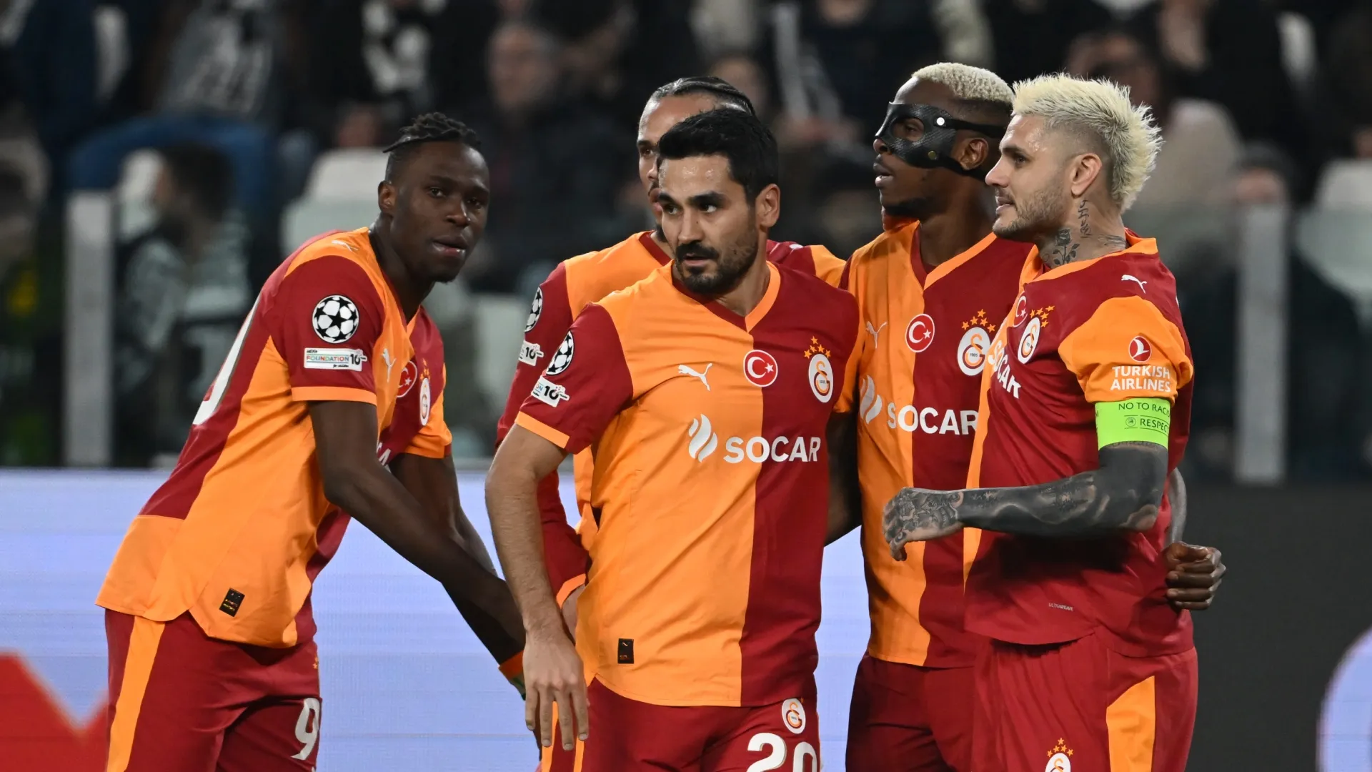Galatasaray players celebrate after a goal