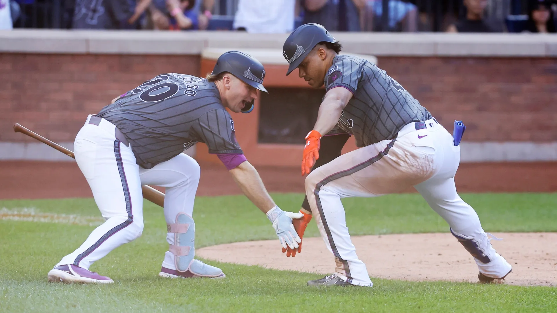 Juan Soto #22 with the Mets celebrates his home run with teammate Pete Alonso #20. Jim McIsaac/Getty Images