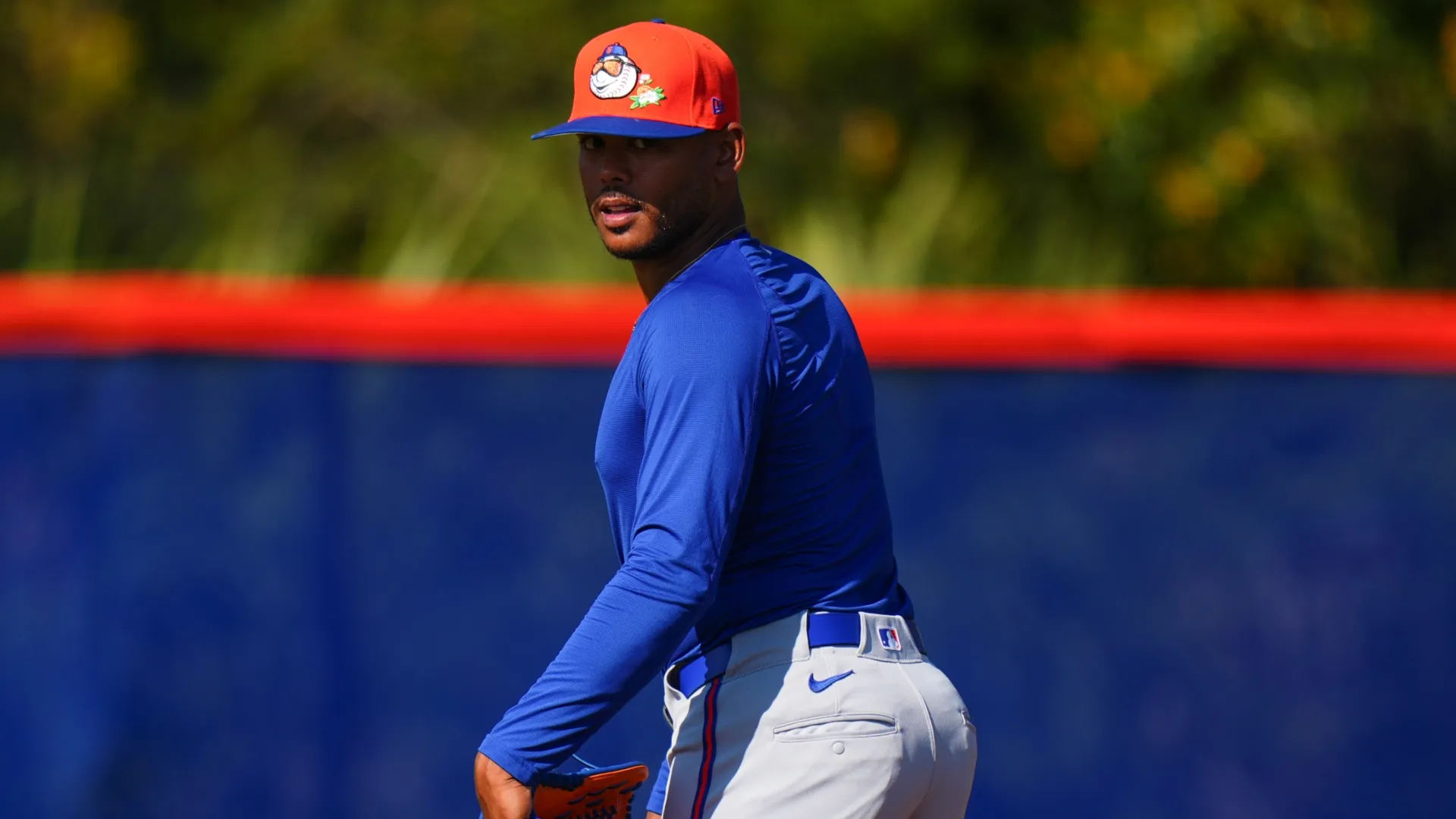Freddy Peralta #51 of the New York Mets looks on during spring training workouts. Rich Storry/Getty Images