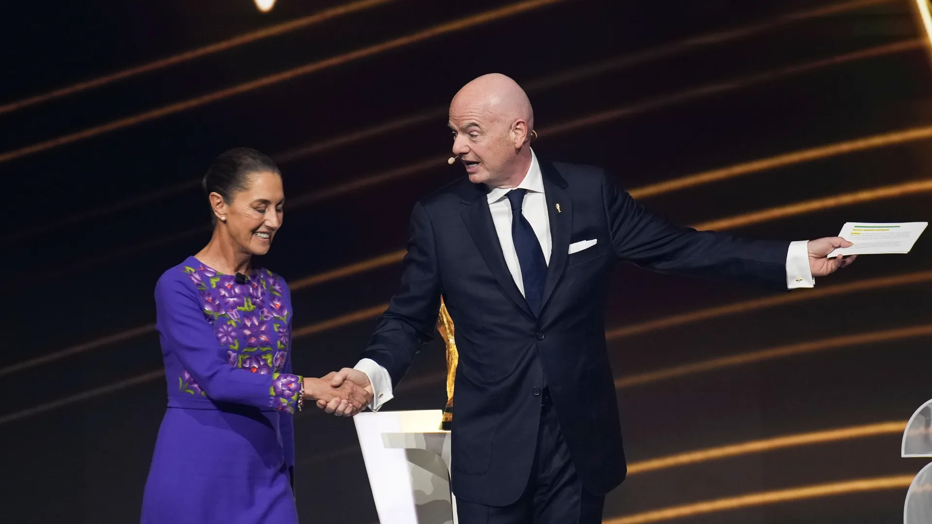 Mexican President Claudia Sheinbaum greets FIFA President Gianni Infantino. (Getty Images)