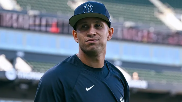 Relief pitcher Keynan Middleton #93 with the Yankees looks on before a game.